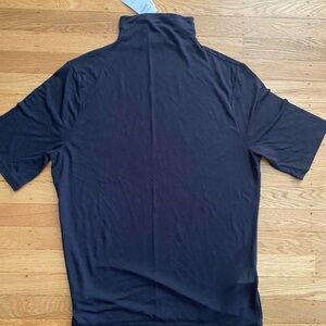 Woman’s Black Sheer Turtleneck Shirt